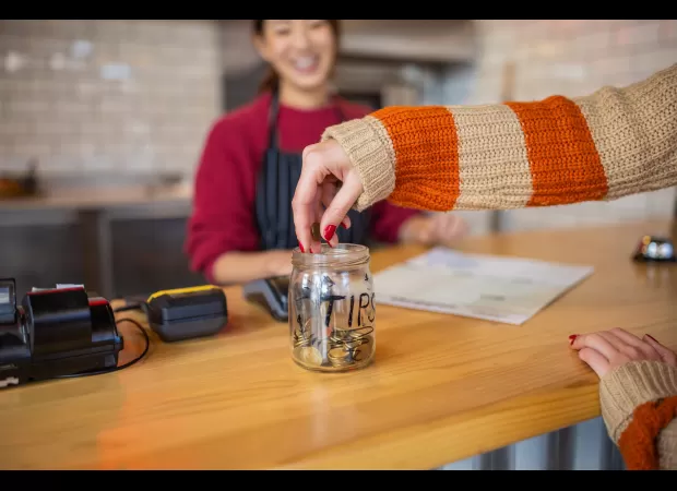 Expert advises on proper tipping etiquette while traveling.