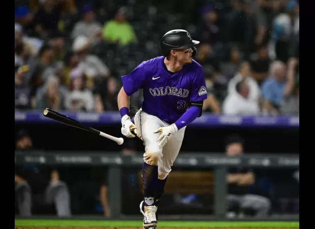 Rockies' lower-ranked players lead team to victory against Marlins with a score of 8-2.