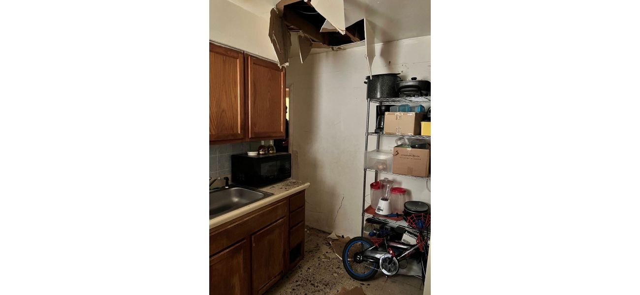 Suspect falls through ceiling during home search by marshals after murder accusation.