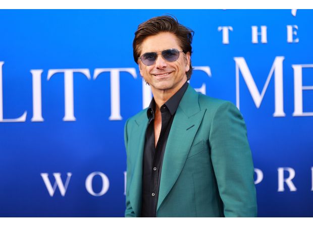 John Stamos explains why he was rejected by Scientology in a humiliating way.