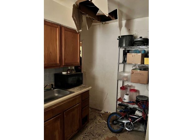 Suspect falls through ceiling during home search by marshals after murder accusation.