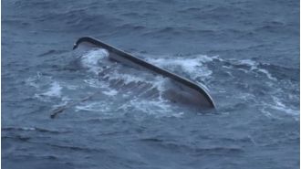 Big wave caused replica Viking ship to overturn, resulting in death of researcher.