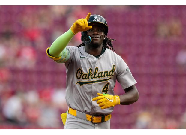 TJ Friedl leads Reds to victory over A's, despite Lawrence Butler's three home runs.