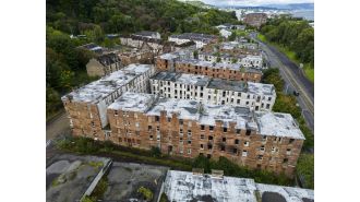 Derelict UK housing complex likened to Chernobyl to be destroyed, but five residents still refuse to leave.