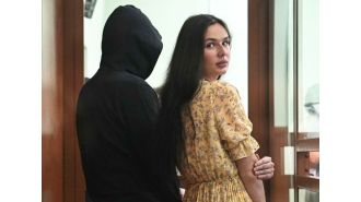 A Russian woman could face 25 years in prison for hiding money in a bin that was intended for use by terrorists.