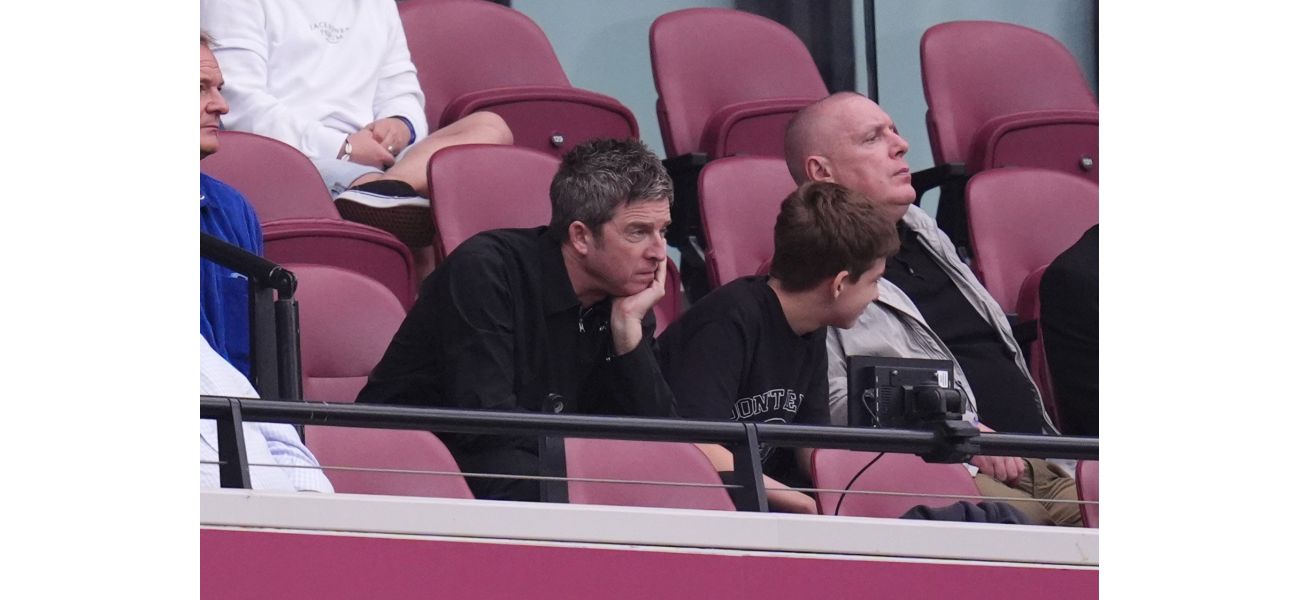 Noel Gallagher takes a break from chaotic Oasis ticket sales to spend time with his son.