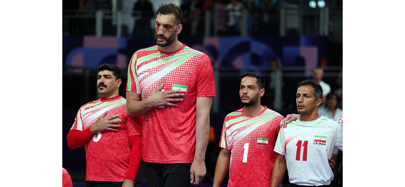 The second tallest man in the world is unable to find a bed in the Paralympic village and has to sleep on the floor.