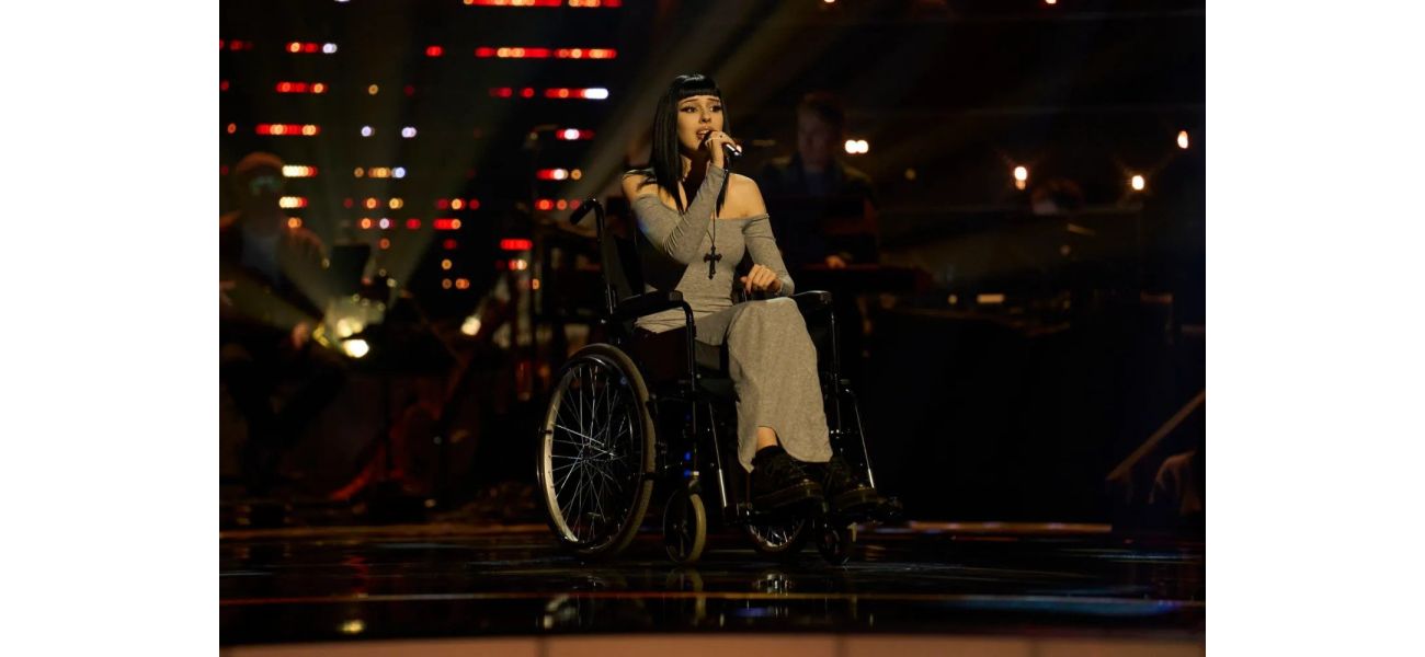 A woman in a wheelchair wows The Voice judges with a moving performance.