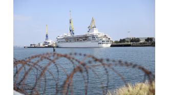 Travelers stranded in Belfast harbor due to purchasing tickets for a three-year-long cruise.