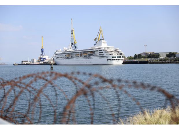 Passengers are stranded in Belfast port after purchasing tickets for a three-year-long cruise.
