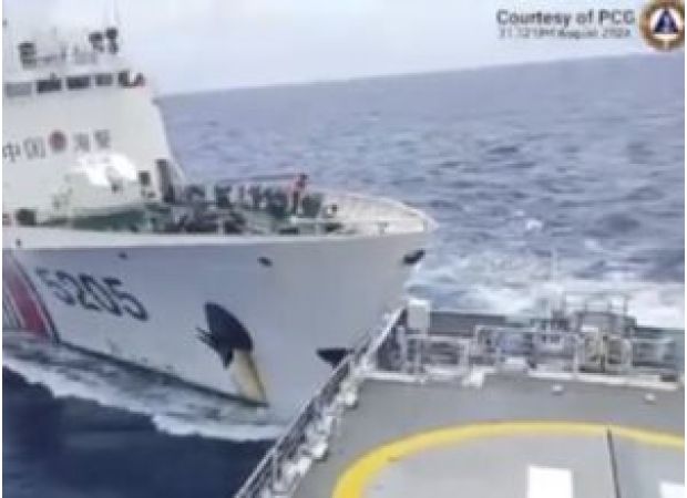 Chinese and Philippine ships crash at disputed island.