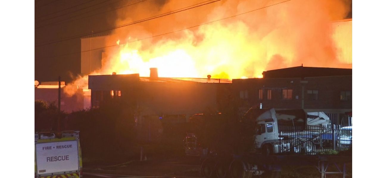 Firefighters struggling to contain factory fire in Sydney's western region.