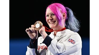 Pregnant Paralympian wins bronze while still seven months along, despite challenges from her baby.