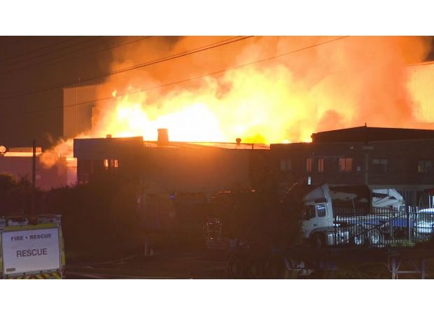 Firefighters struggling to contain factory fire in Sydney's western region.