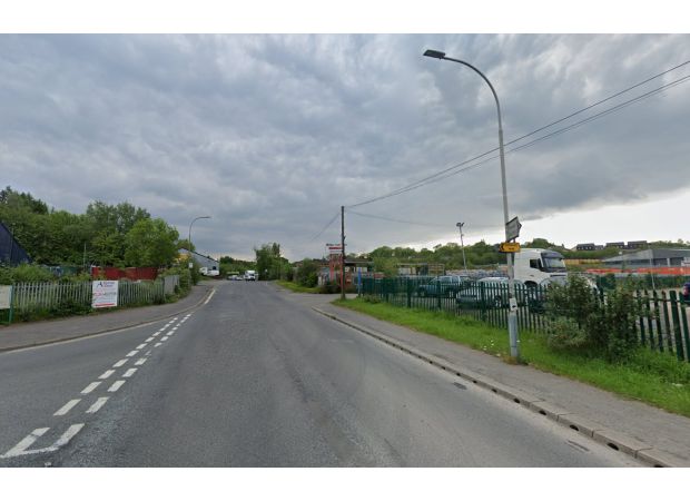 A pilot has passed away following a light aircraft accident in an industrial area.