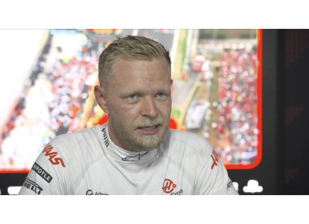 F1 racer frustrated by race ban for colliding with opponent at Italian Grand Prix.