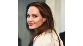 Actress Angelina Jolie asks children for assistance while filming 'Maria.'