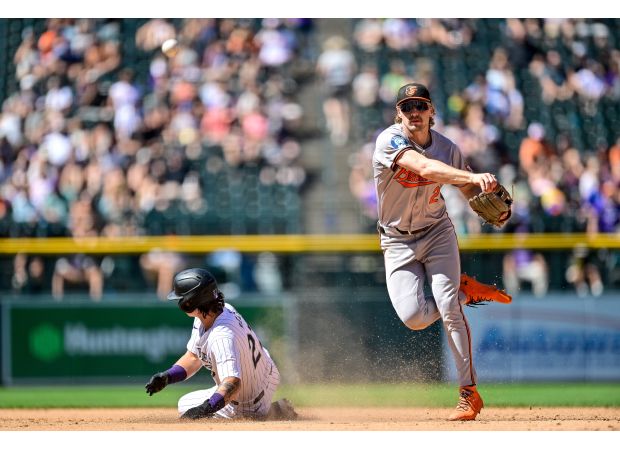 Zach Eflin shines against the Rockies in Orioles' easy 6-1 win at Coors Field.