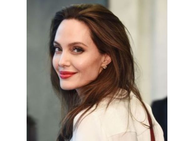 Actress Angelina Jolie asks children for assistance while filming 'Maria.'