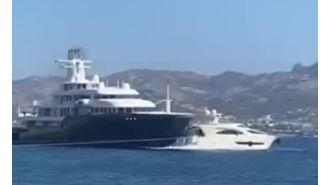 A luxury yacht worth £95m collides with a smaller boat, causing passengers to cry out in alarm.