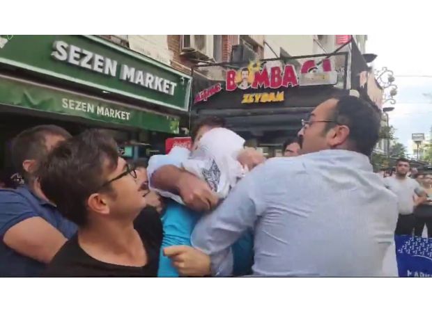 Turkish youths put hood on man's head, attack US soldiers.