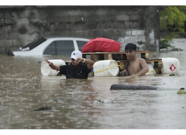 14 people, including a pregnant woman, died in landslides caused by Tropical Storm Yagi.