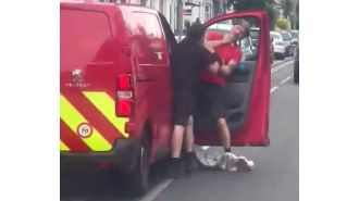 Driver violently attacks postman in road rage incident.