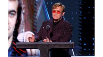 Elton John's eye impaired after serious infection.
