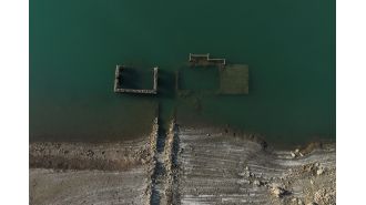 A Greek village has resurfaced after a drought caused a lake to dry up.