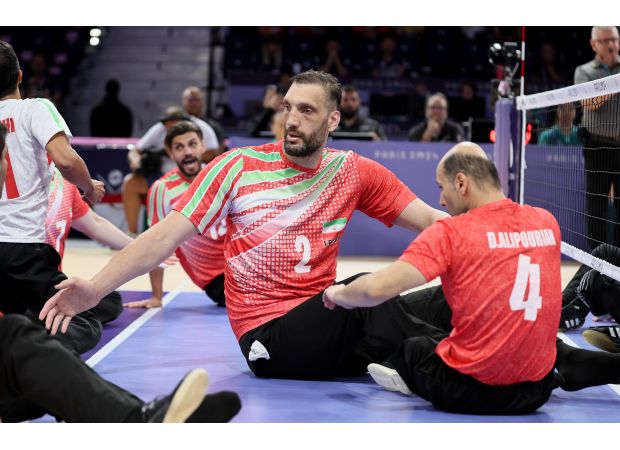 Tall man now has bed that fits in Paralympic village, no more sleeping on the floor.