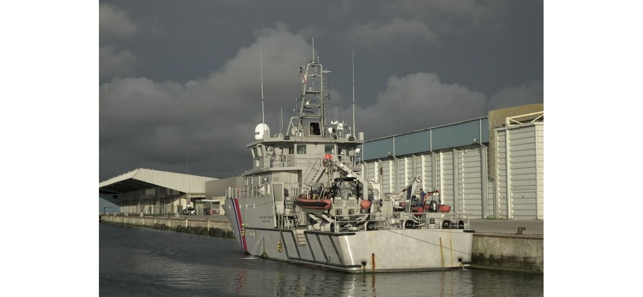 12 people die as migrant boat breaks apart in English Channel.