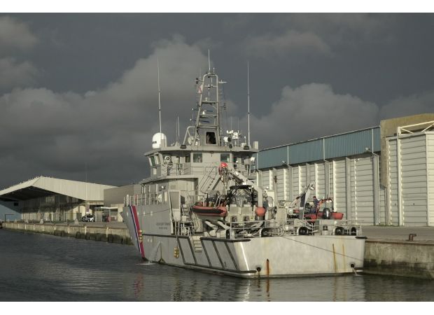 12 people die as migrant boat breaks apart in English Channel.