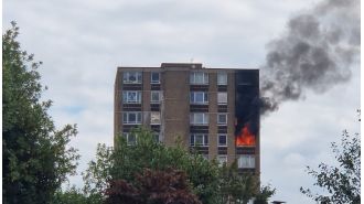 A serious fire erupts in a London high-rise building on the same day a report on the Grenfell Tower tragedy is released.