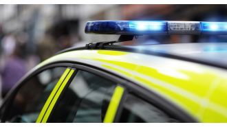 A young child falls out of a two-story window, leading to the arrests of a man and woman.