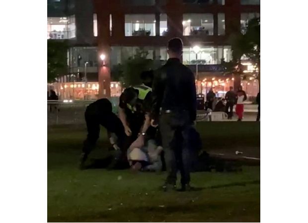 Video shows Manchester officers allegedly hitting restrained man.
