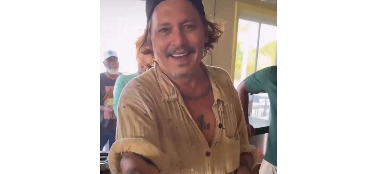Johnny Depp shows off his new white teeth after previously suffering from severe tooth decay.