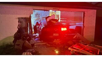 Couple's dinner interrupted when car crashes through living room