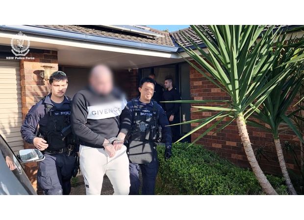 A suspected member of a motorcycle gang has been arrested for attacking and stomping on a man in Sydney.