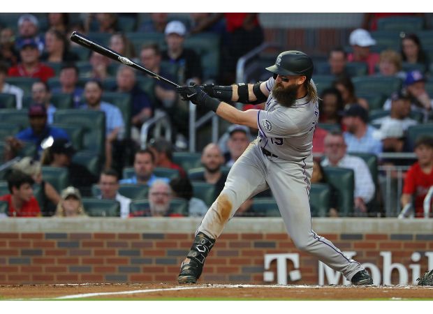 Rockies struggle in 16-strikeout game as Braves win series early.
