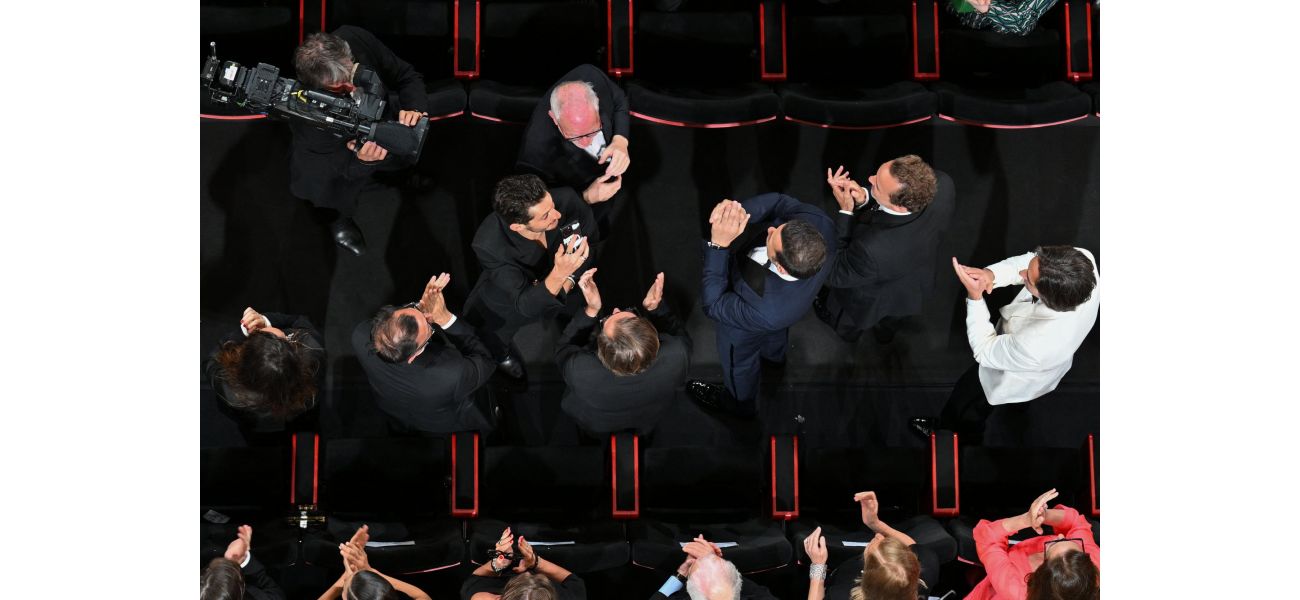 Explanation of the wild 20-minute standing ovations at film festivals.