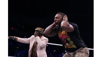 Wrestler cries as opponent destroys childhood home in fire.