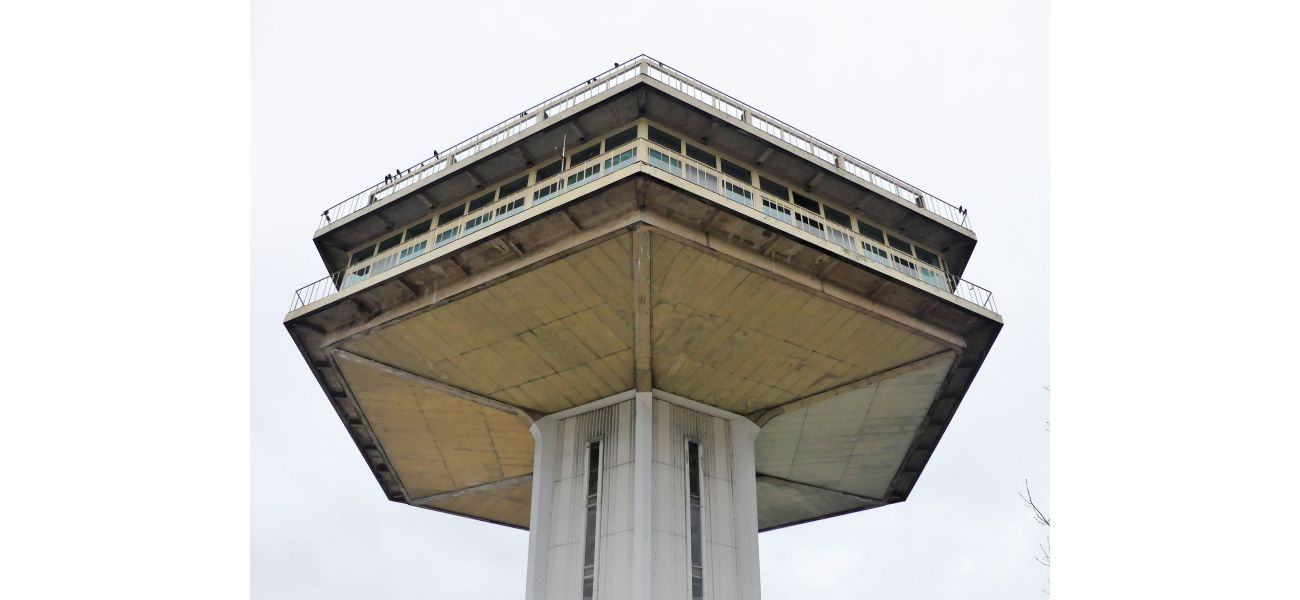 A futuristic tower worth £14 million abandoned near a UK highway.
