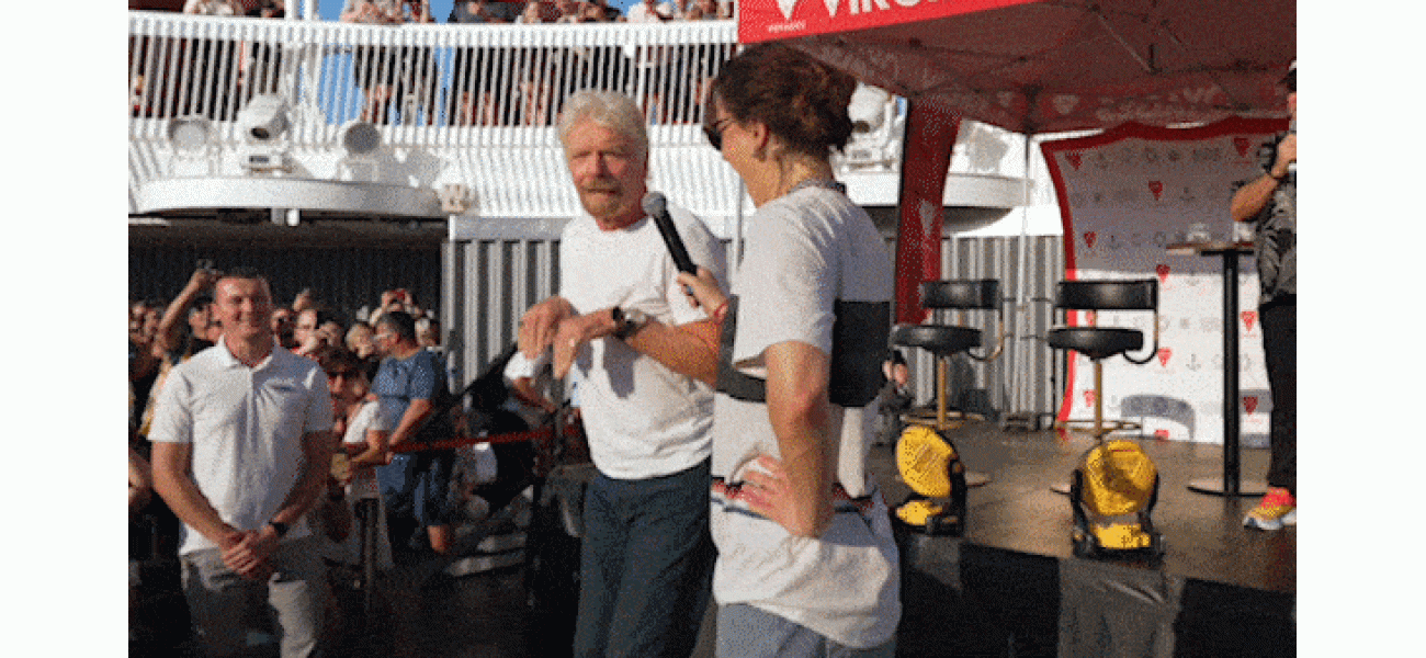 Raygun teaches Branson breakdancing on Virgin cruise.