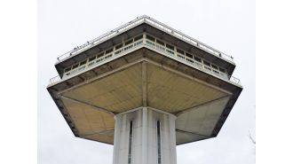 A futuristic tower worth £14 million abandoned near a UK highway.
