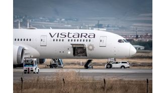 A plane was forced to land unexpectedly after a note claiming there was a bomb on board was discovered in the bathroom.