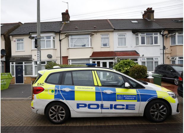 A mother of three cried for assistance while running down the street on fire.