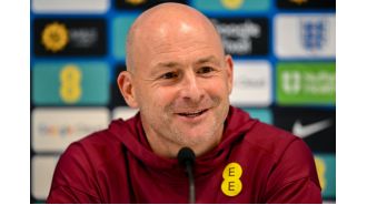 Four English soccer players didn't sing national anthem due to a controversy involving manager Lee Carsley.