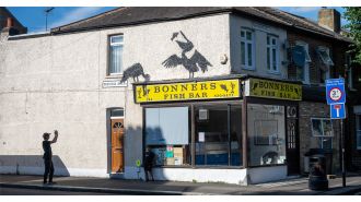 The owner of a Banksy fish and chip shop is concerned about safety after becoming famous.