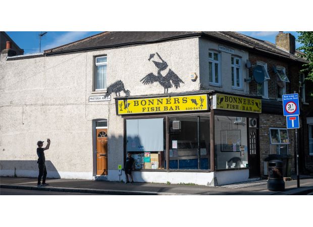 The owner of a Banksy fish and chip shop is concerned about safety after becoming famous.
