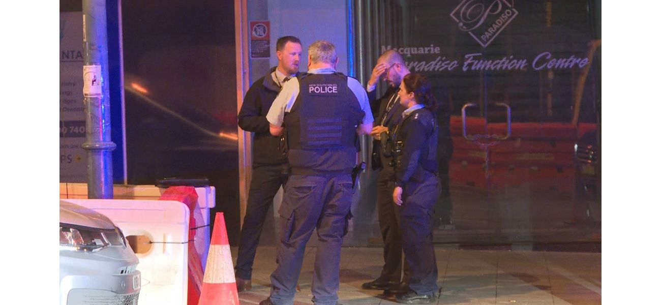 A man was reportedly stabbed several times while attempting to protect a woman in Sydney.